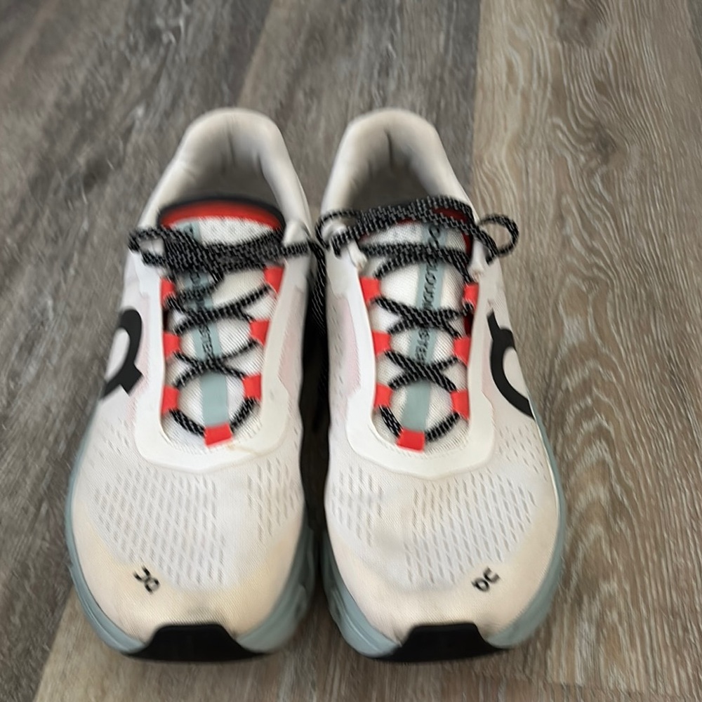 White and Black Running Shoes